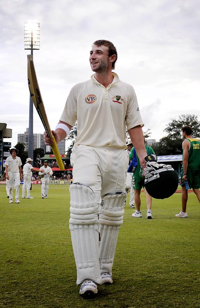 Phillip Hughes makes his way from the ground at the end of Day 3 in Durban in 2011.