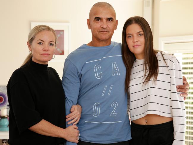 Rod Silva — with his wife Deb and daughter Keely — is speaking out about violence against women. Picture: Jonathan Ng