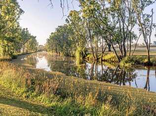 BEFORE THE STORM: Water levels have soared to 70cm above normal levels. Picture: Steven Kasper