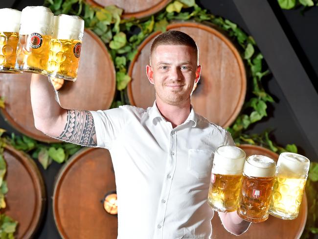 Bavarian Bier Cafe general manager Roman Haslinger poses with German bier during a photo shoot at Castle Hill on Tuesday October 2nd. Oktoberfest bier guide complied by our bier connoisseur, Roman Haslinger, originally from Munich, whose knowledge of Bavarian bier and food is outstanding. (AAP IMAGE / Troy Snook)