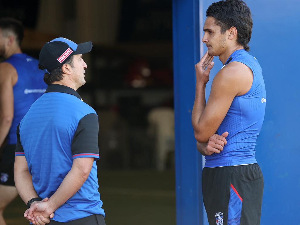 Bulldogs coach Luke Beveridge and the young forward during his first year at the club. Picture: Michael Klein