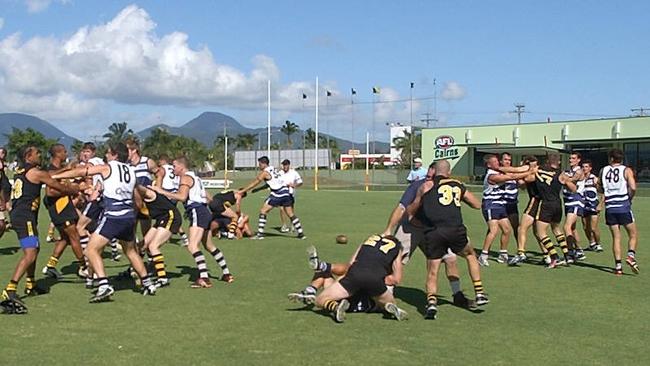 Port Douglas and North Cairns players brawl in the 2004 grand final.