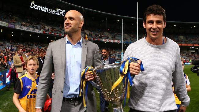 Andrew Embley (right), seen here with former teammate Chris Judd, is a West Coast great. (Photo by Paul Kane/Getty Images)