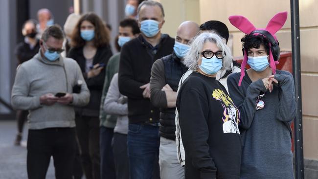 MELBOURNE, AUSTRALIA - NewsWire Photos AUGUST 19, 2021: People queue at the COVID testing centre at the Prahran Town Hall. Picture: NCA NewsWire / Andrew Henshaw