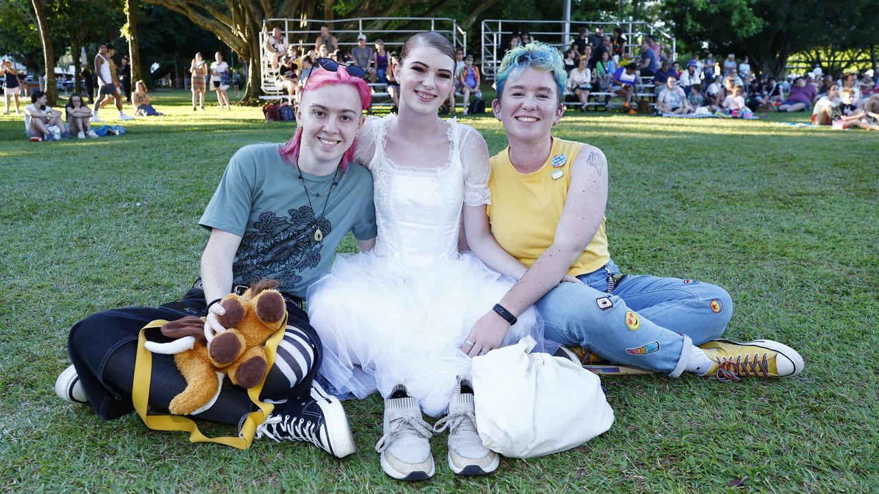 Banjo Robinson, Ria Scott and Alec Humphreys at the Cairns Pride Evening of Light at Forgarty Park on Sunday, part the 2023 Cairns Pride Festival. Picture: Brendan Radke