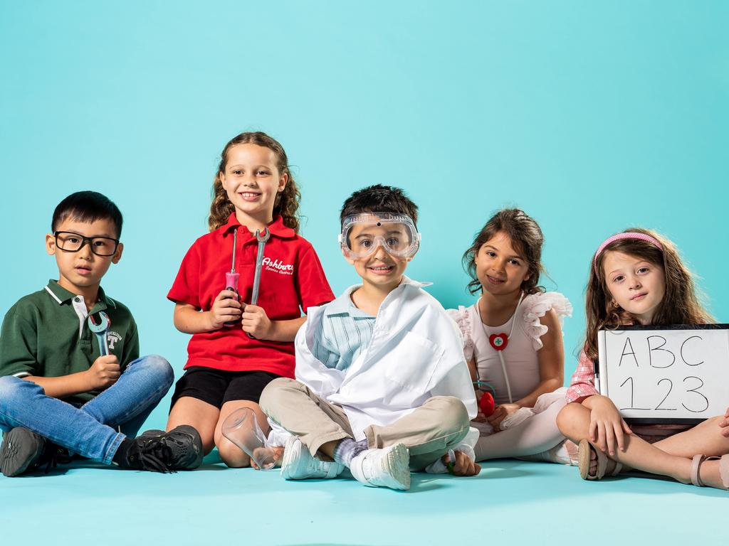 Kindergarten students Jonathan, Chloe, Luca, Annabelle and Aaliyah are excited about going to school and becoming their dream professions - engineer, mechanic, scientist, dancer/doctor and teacher.

Photo: Tom Parrish