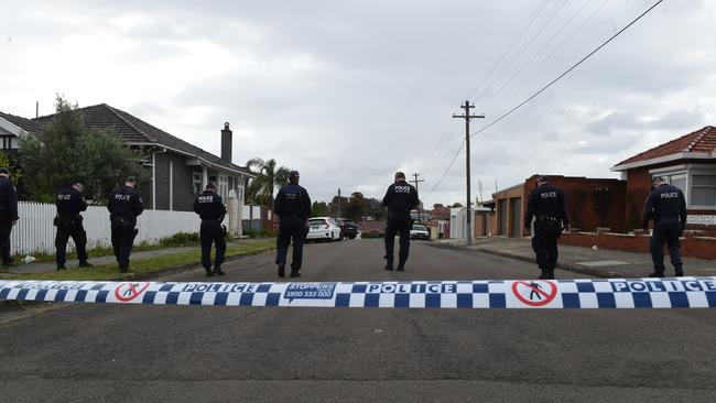 Police conducting a sweep of Larkhall St after the murder of Pasquale Barbaro. Picture: AAP Image/Dean Lewins