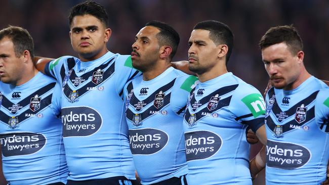 Latrell Mitchell, Josh Addo-Carr and Cody Walker did not sing the national anthem before the State of Origin clash in Brisbane last year Picture: Getty Images