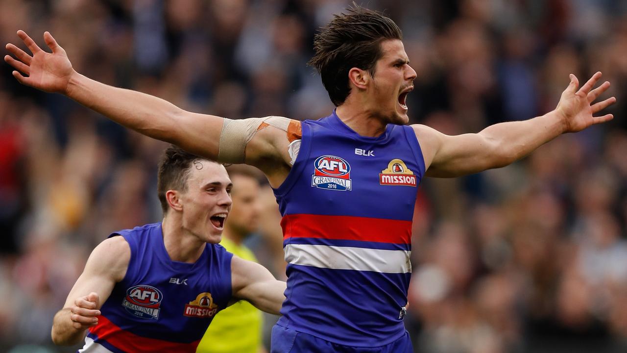 Tom Boyd celebrates a goal during the 2016 Grand Final.