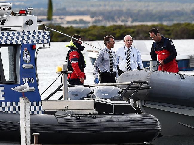 Police recover debris from the crashed plane in 2016. Picture: Nigel Hallett