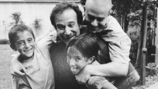 Robin Williams with his kids Zelda, Zak and Cody.