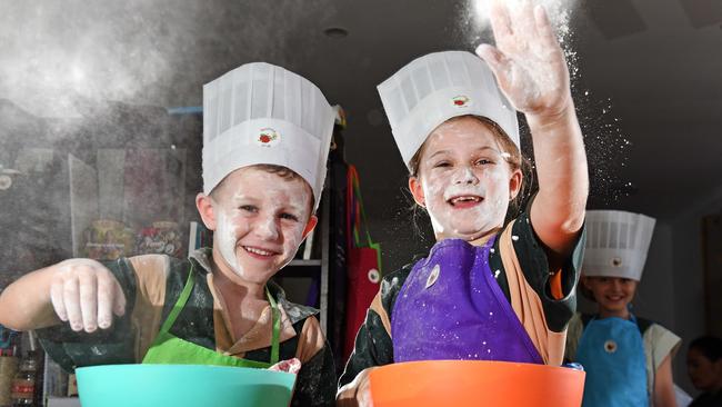 Oscar 6 and Tahlea Little 8 at a cooking class. Picture: John Gass