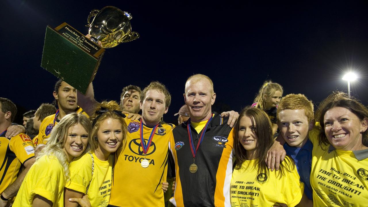 (From left) Ellie, Chloe, Aaron, George, Natalie, Fraser and Louise McVeigh celebrate the Hawks' win. Photo: Kevin Farmer