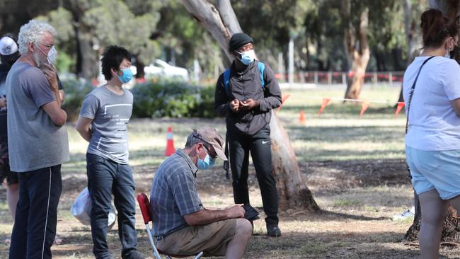 People queue at the COVID-19 testing station at Parafield on November 19. Picture: Tait Schmaal.