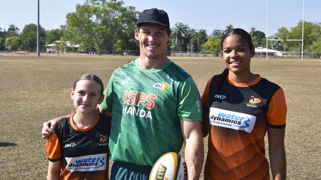 Isabella Driffield (left) and Mariama Little with Michael Hooper after the Men's national teams training session in Palmerston. Picture: Darcy Jennings.