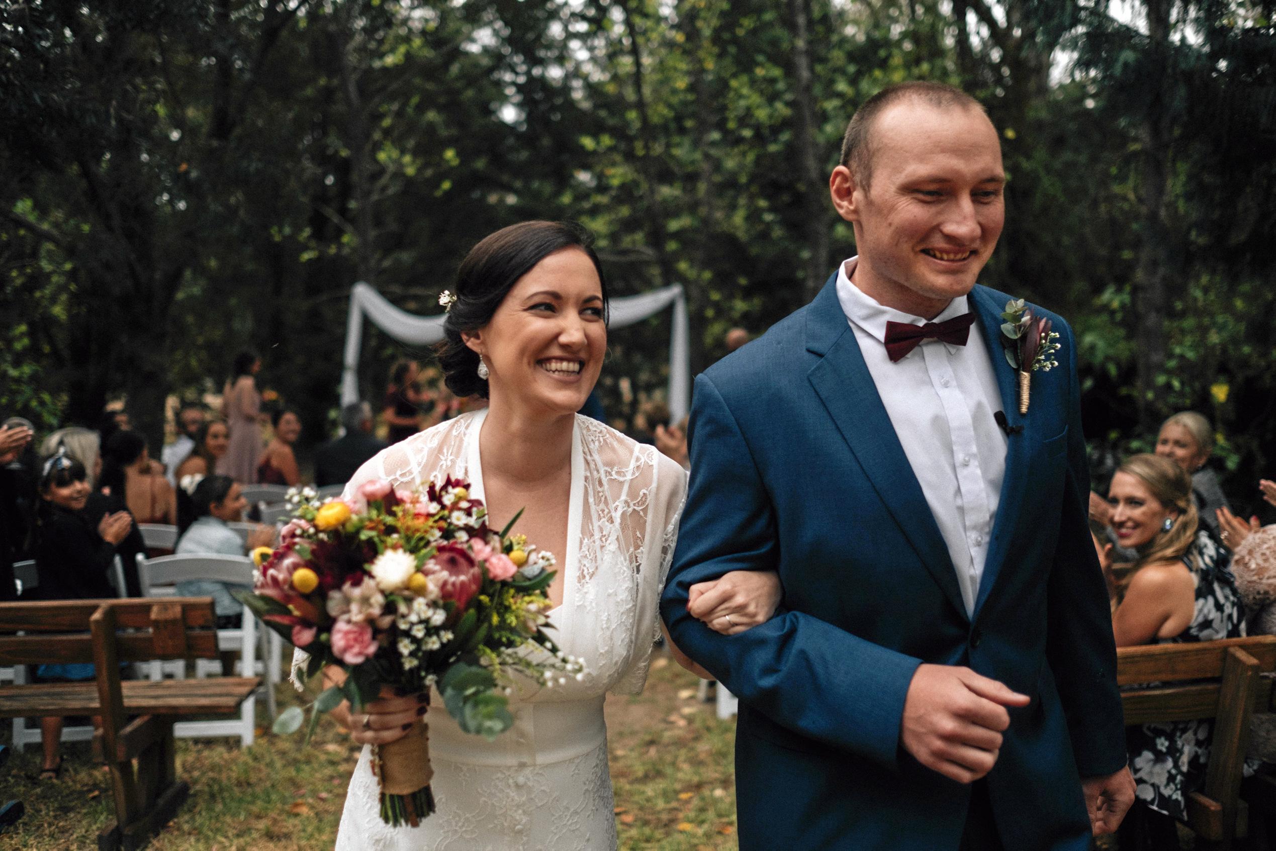 Ella and Brett wed at Honeysuckle Cottages in Stanthorpe. Picture: Richard Grainger Photography