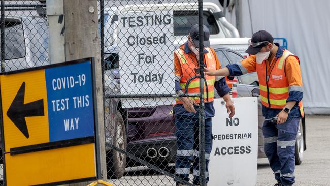 Workers close the a Covid testing site after it reached capacity on Sunday afternoon. Picture: David Geraghty