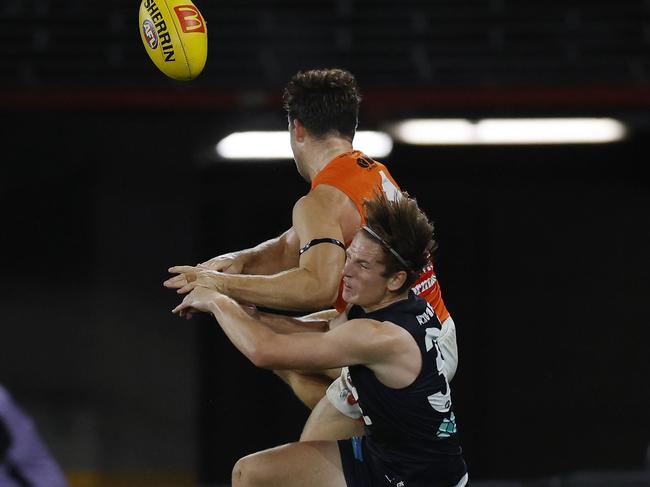 Toby Greene collides with Jordan Boyd. Picture: Michael Klein