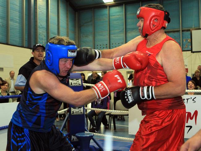 a Day in the life of Will Hodgman, picture of Will at the Bridgewater PCYC for a boxing match with Hobart 7 HO FM radio announcer Mick Newell.