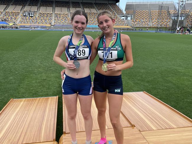 Isabelle Judeand Ginger Cox after their race. Cox set a new record.