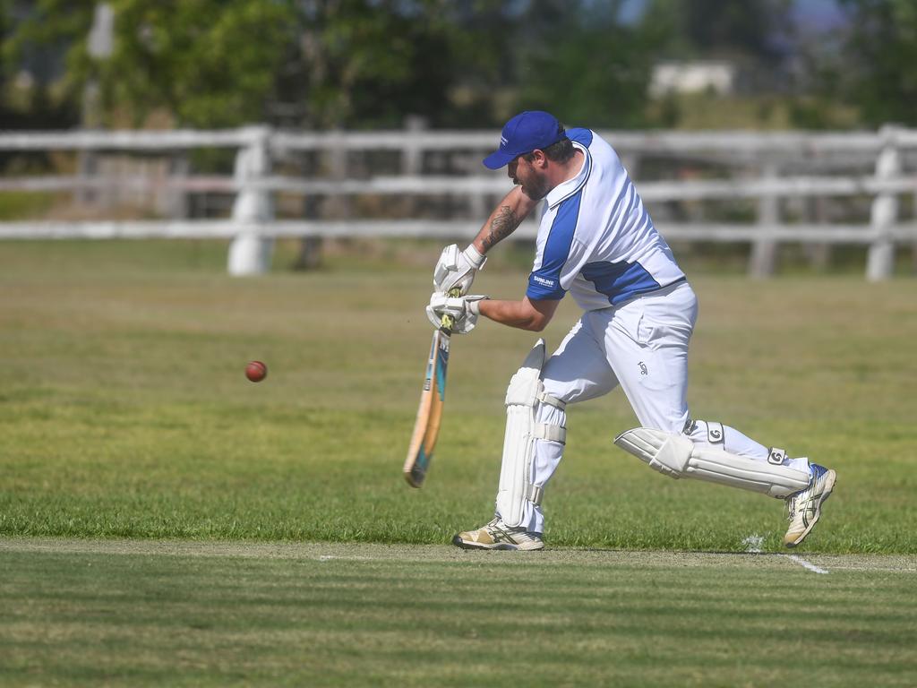 Andrew Ellis hits a ball high into the outfield for Tucabia-Copmanhurst.