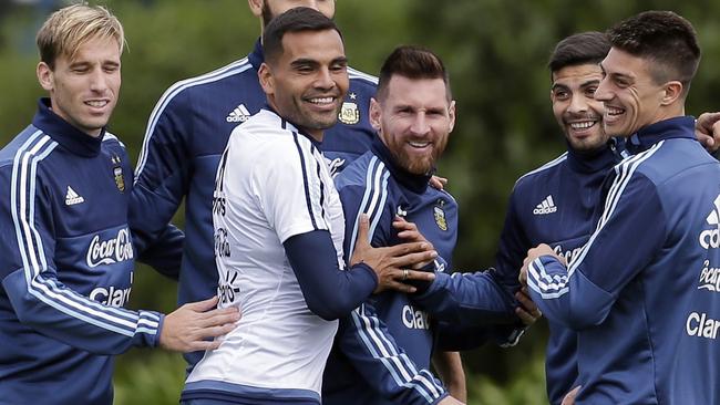 Argentina's Lionel Messi (C) in training with teammates.