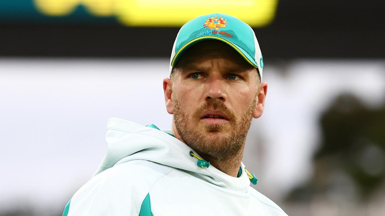 GOLD COAST, AUSTRALIA - OCTOBER 05: Aaron Finch of Australia warms up ahead of game one of the T20 International series between Australia and the West Indies at Metricon Stadium on October 05, 2022 in Gold Coast, Australia. (Photo by Chris Hyde/Getty Images)