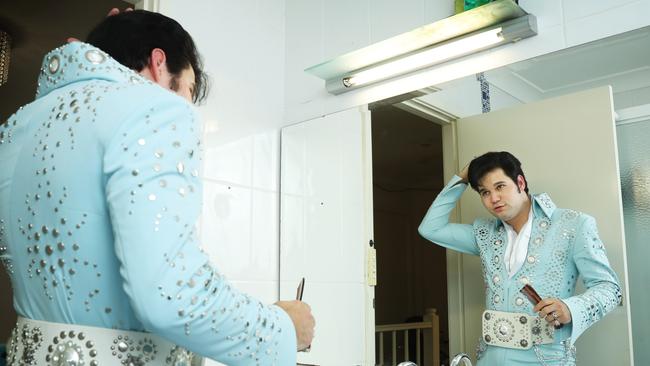 Emilio Prince puts the finishing touches to his ‘young Elvis’ look as he prepares to perform at this year’s Parkes Elvis Festival. Picture: John Feder