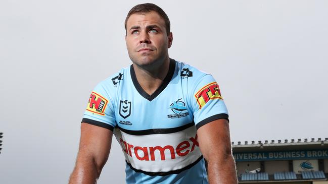 Sharks skipper Wade Graham shows off the club’s new jersey sponsor Aramex. Picture: Richard Dobson