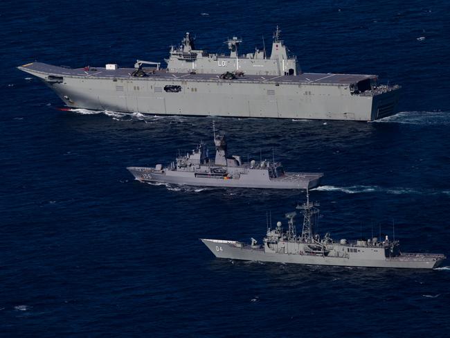 Royal Australian Navy ships Adelaide, Toowoomba and Darwin in formation off the coast of Sydney. HMAS Adelaide has a ski ramp, but no F-35Bs. Picture: Defence