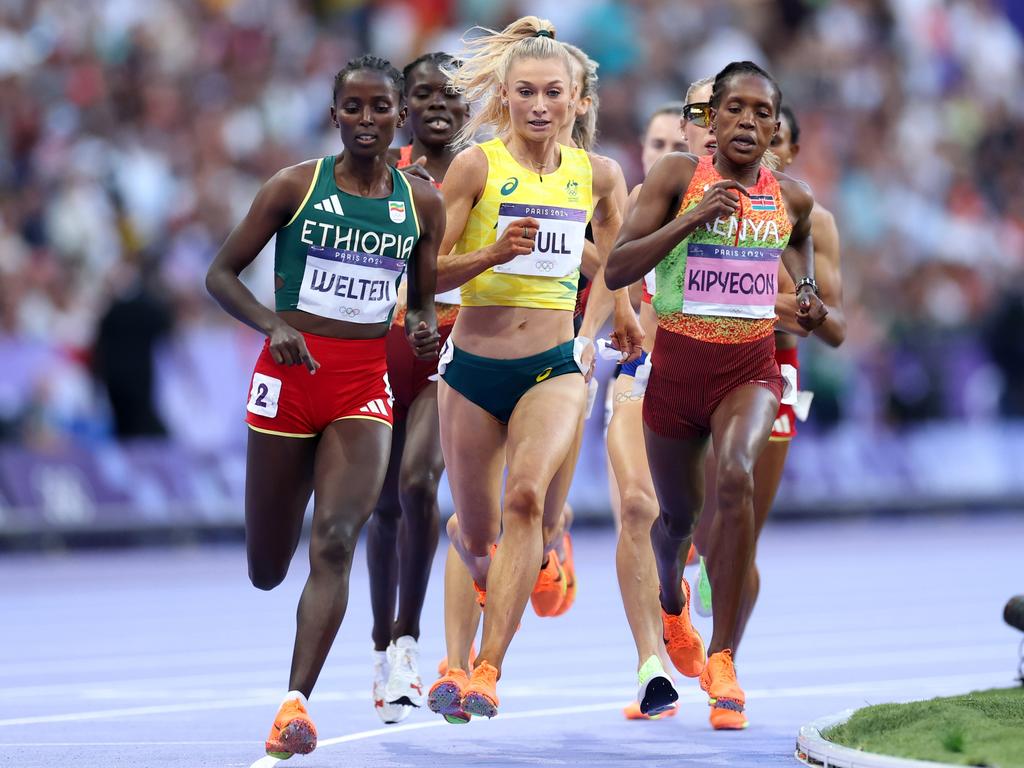 Faith Kipyegon of Team Kenya is seen on the inside and Diribe Welteji of Team Ethiopia is on the outside as Jessica Hull of Team Australia holds her composure in the 1500m final and ultimately wins her historic silver. Picture: Michael Steele/Getty Images