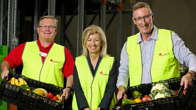 Coles CEO Steven Cain, SecondBite founder Simone Carson, and Jim Mullan, CEO of SecondBite