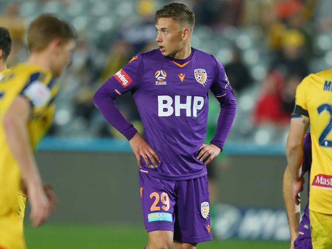 GOSFORD, AUSTRALIA - JULY 18: Kristian Popovic of Perth Glory reacts to a missed penalty during the round 29 A-League match between the Perth Glory and the Central Coast Mariners at Central Coast Stadium on July 18, 2020 in Gosford, Australia. (Photo by Ashley Feder/Getty Images)