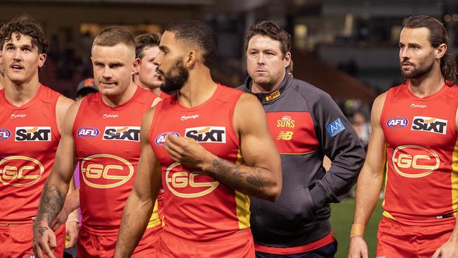 Stuart Dew walks off with his team after the loss to Port Adelaide on Saturday night. (Photo by Sarah Reed/AFL Photos via Getty Images)