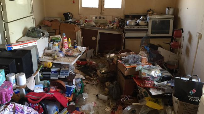 The kitchen in this house has become so full of possessions that people can’t cook in it.