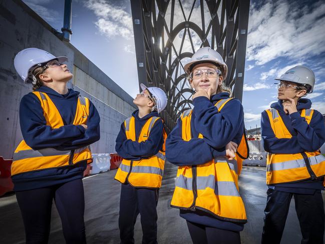 Footscray City Primary school students Isobel, June, Tilly and Laeto think about what the new West Gate Tunnel should be named. Picture: Jake Nowakowski