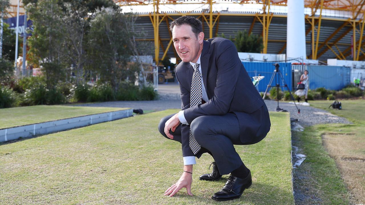 CEO of Cricket Australia James Sutherland inspects the drop in pitch outside Metricon while announcing the 2018/19 international cricket schedule. (Photo by Chris Hyde/Getty Images)