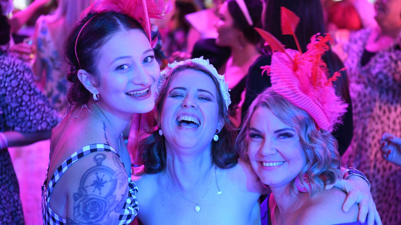 Jody Ferry, Melissa Dent and Lisa Moriarty on the dance floor at Darwin Ladies Day. Picture: (A)manda Parkinson