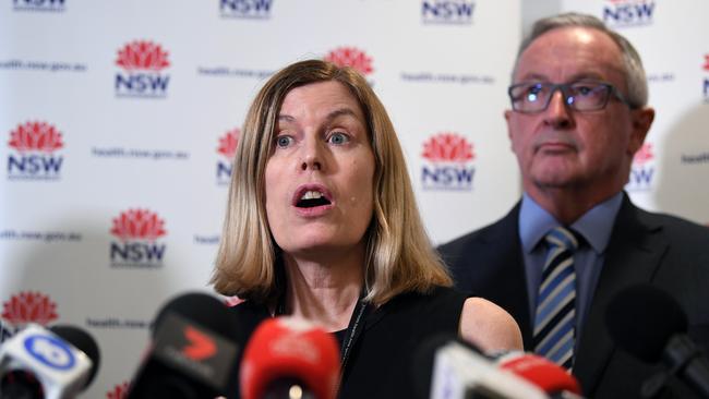 NSW Health Minister Brad Hazzard (right) and NSW Chief Health Officer Dr Kerry Chant speak to the media at the NSW Ministry of Health in Sydney. (AAP Image/Joel Carrett)