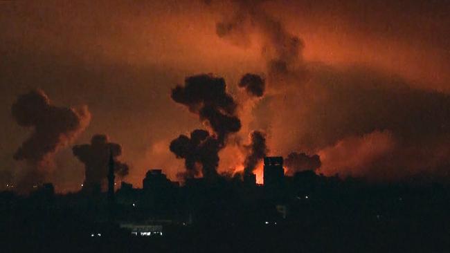 Fire and smoke rising above Gaza City during an Israeli strike on October 27. Picture: AFP