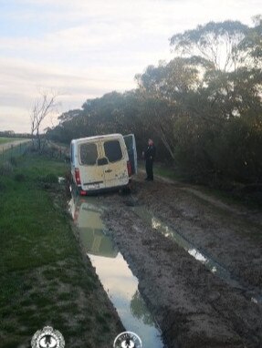 South Australian police found two men and their van bogged as they tried to cross the border from Victoria. Photo: South Australia Police