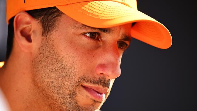 Daniel Ricciardo of Australia and McLaren talks to the media in the Paddock