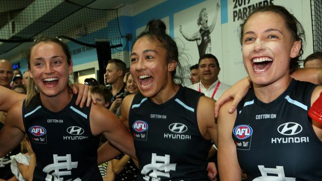 Darcy Vescio of the Blues celebrates with teammates in the rooms after the AFLW Preliminary Final