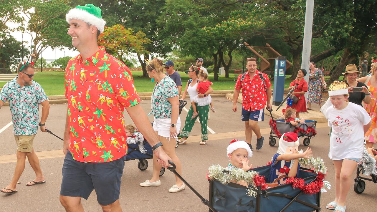 Michael Prentice with Archie and Riley in the annual Christmas Pageant and Parade down the Esplanade and Knuckey Streets. Picture: Glenn Campbell