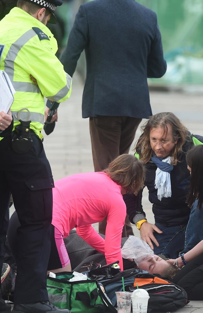 As people lay injured on the Westminster Bridge, one woman victim (not pictured) was thrown into the Thames.