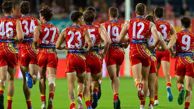 Gold Coast Suns before their Round 13 match at TIO Stadium last season. Picture: Che Chorley