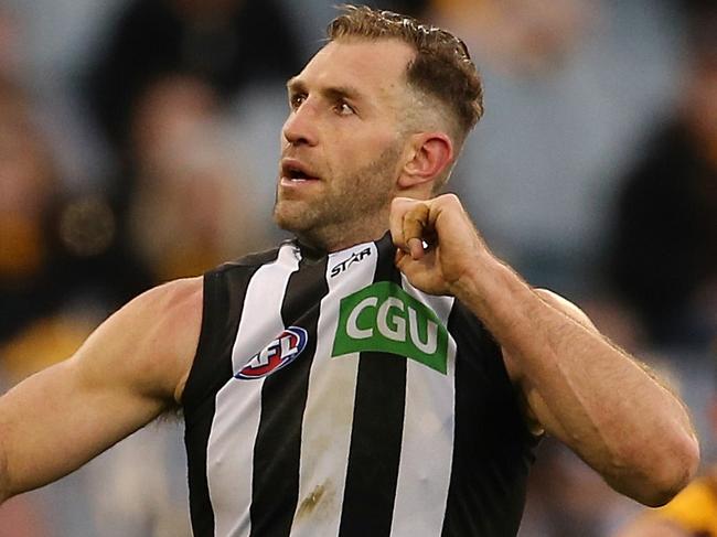 Hawthorn v Collingwood Travis Cloke pulls his Collingwood jumper after kicking a goal 4th term Picture:Wayne Ludbey