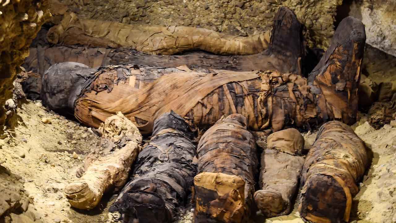 This picture taken on February 2, 2019 shows newly-discovered mummies wrapped in linen found in burial chambers dating to the Ptolemaic era (305-30 BC). Picture: Mohamed el-Shahed
