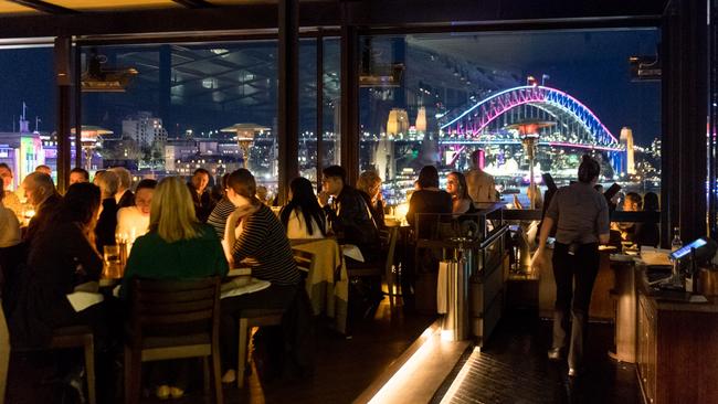 Take in the view of the Harbour Bridge and the Opera House in all their glory during Vivid from Cafe Sydney.