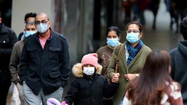 Queenslanders are once again being encouraged to wear masks as Covid cases soar. Picture: David Clark